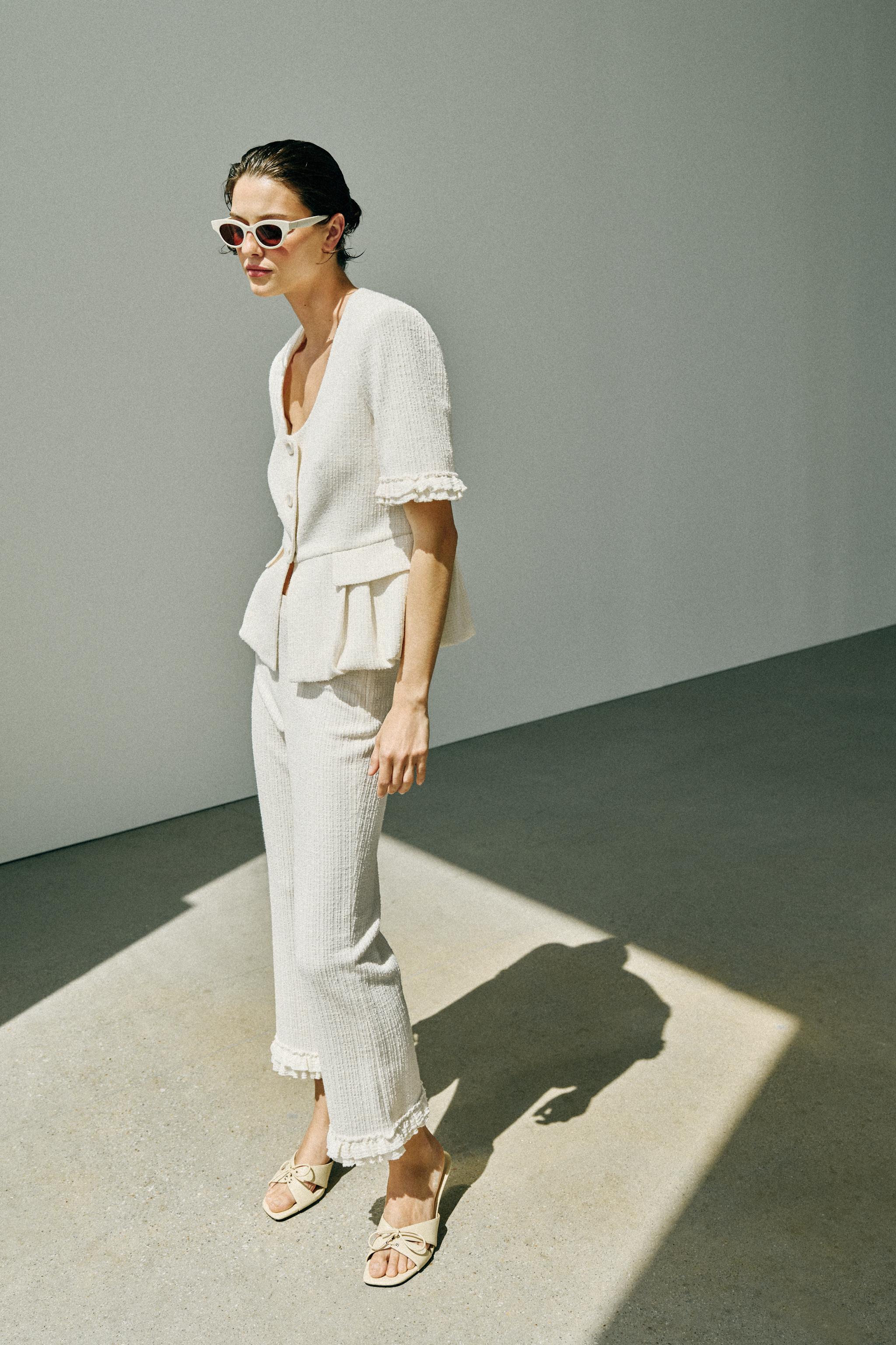 SHORT-SLEEVE RUFFLED PEPLUM JACKET
